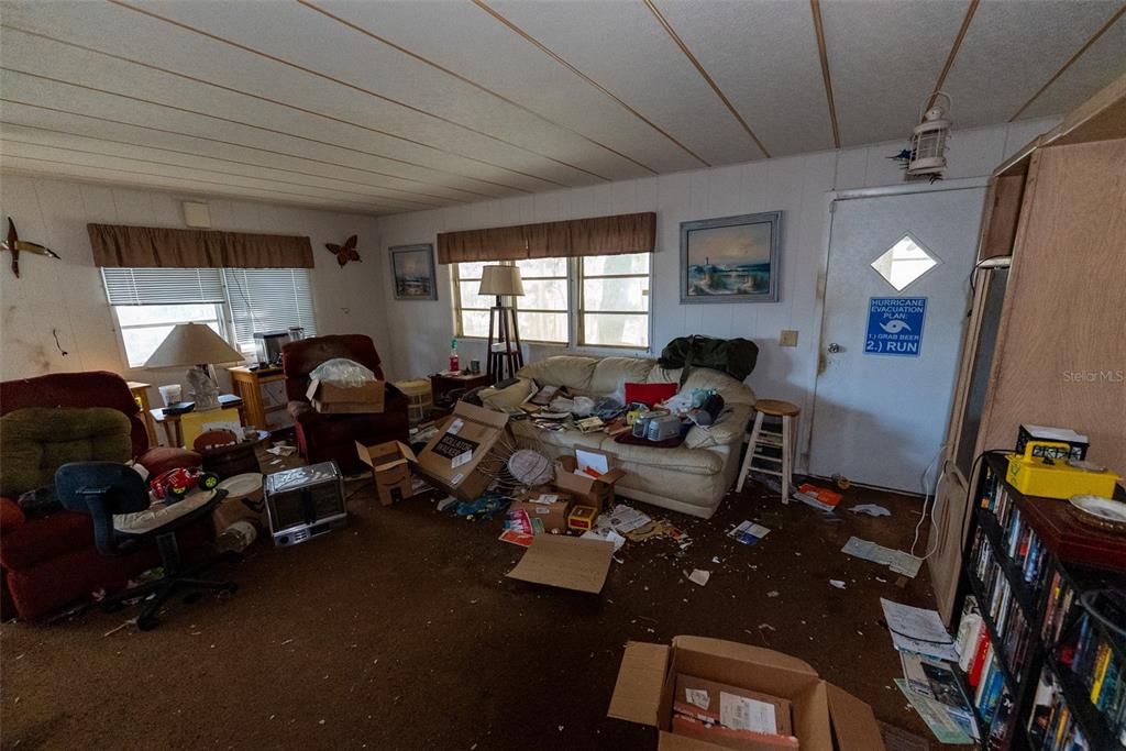 24971 Northeast 135th Street Salt Springs, FL 32134 - Photo 39 of 49 a room with lots of gym equipment