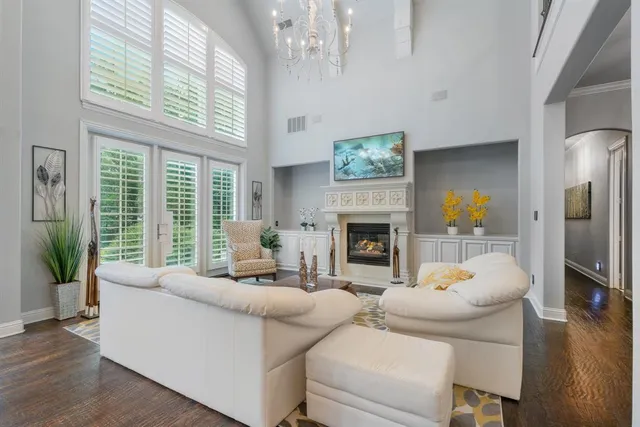 a kitchen with stainless steel appliances a stove a sink and cabinets