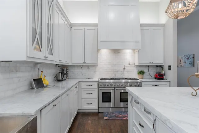 a bedroom with a bed and a cabinets