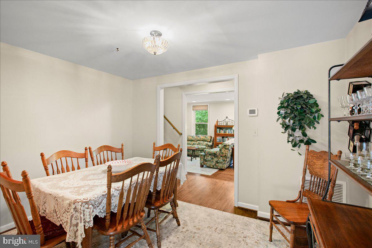 19266 Mockingbird Heights Road Triangle, VA 22172 - Photo 10 of 35 a view of a dining room with furniture