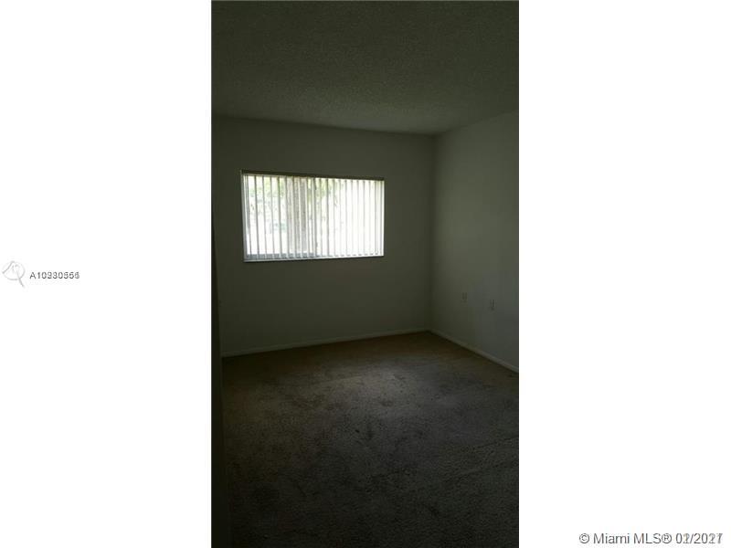 1133 Benoist Farms Road, Unit 101 West Palm Beach, FL 33411 - Photo 5 of 9