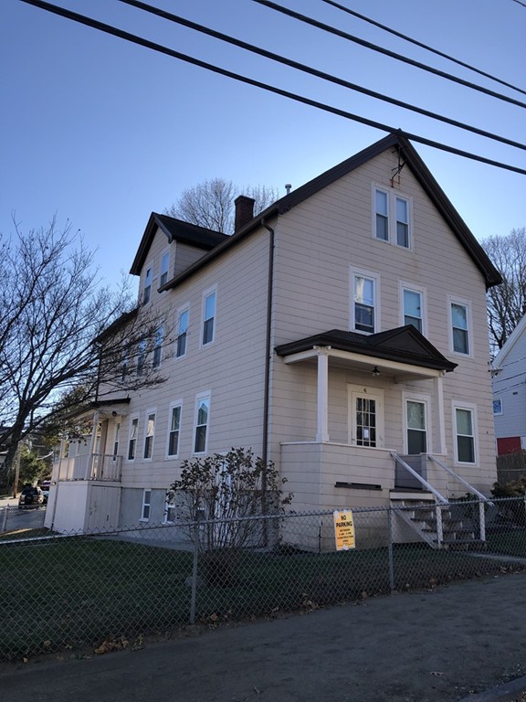 41 Whipple Street Worcester, MA 01607 - Photo 1 of 2 a front view of a house with a yard