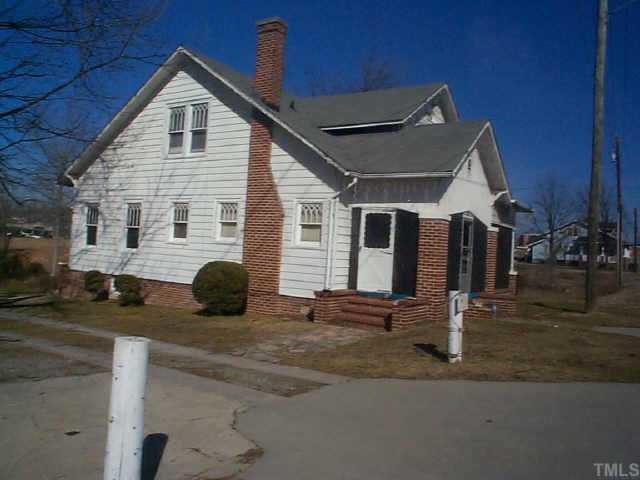 1522 Durham Road Roxboro, NC 27573 - Photo 2 of 2 a view of a house with a patio