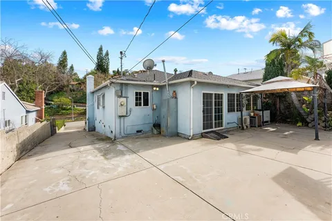 a view of a house with a patio