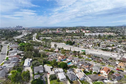an aerial view of a city with lots of residential buildings