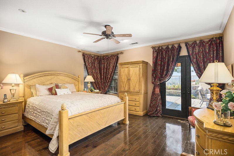 6962 Magdalena Drive Orange, CA 92867 - Photo 12 of 23 a bedroom with a bed a dresser and window