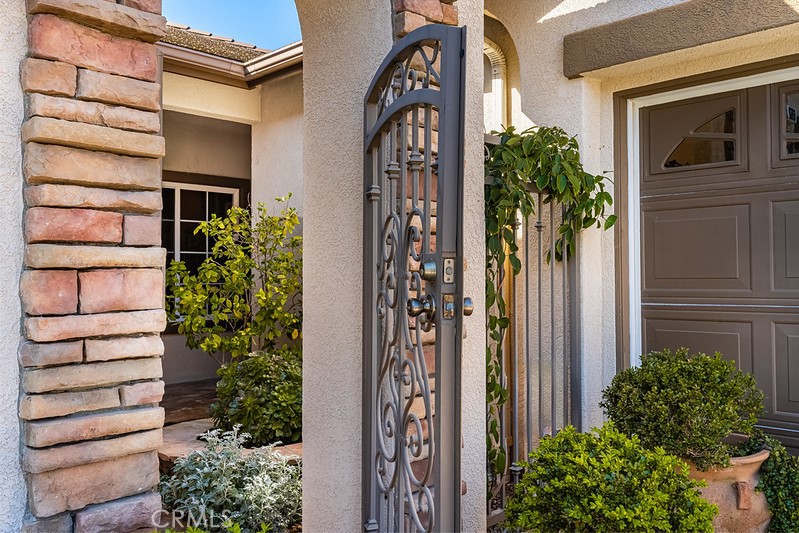 6962 Magdalena Drive Orange, CA 92867 - Photo 2 of 23 a view of a house with a flower garden