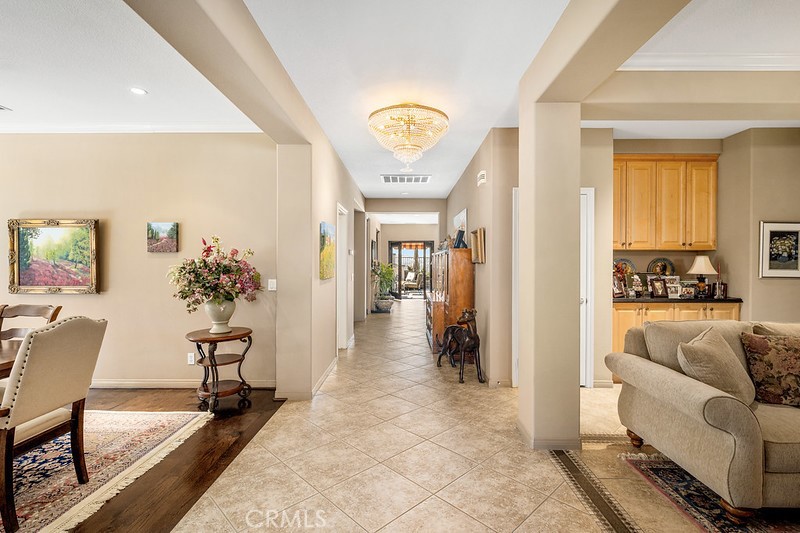 6962 Magdalena Drive Orange, CA 92867 - Photo 3 of 23 a living room with furniture and a chandelier