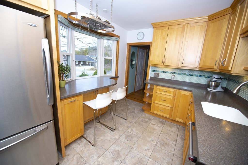 63 Pine Street Natick, MA 01760 - Photo 5 of 19 a very nice looking room with a large window