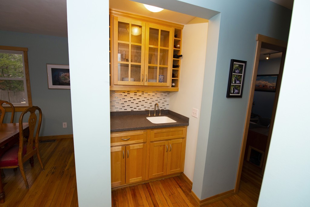 63 Pine Street Natick, MA 01760 - Photo 9 of 19 a bathroom with a sink and a mirror