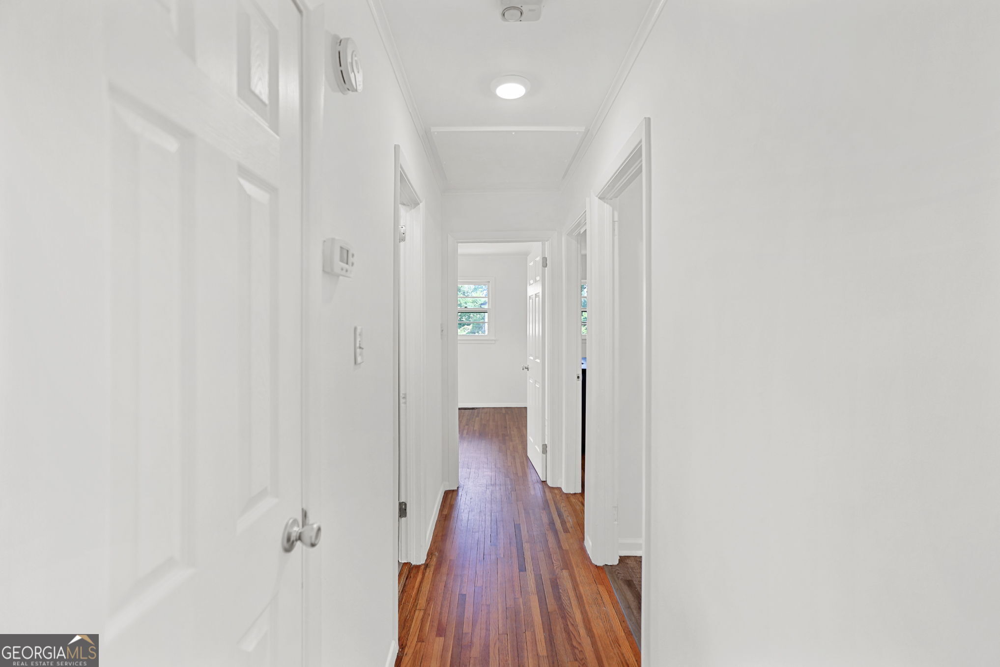 12 Conner Drive Newnan, GA 30263 - Photo 16 of 28 a view of a hallway with wooden floor