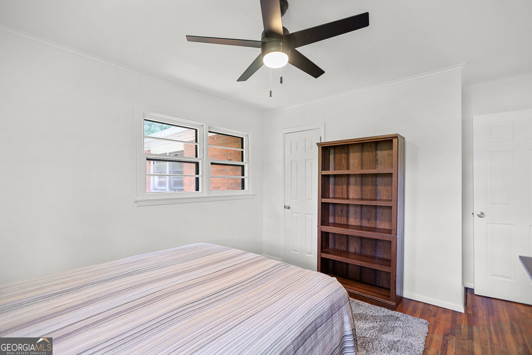 12 Conner Drive Newnan, GA 30263 - Photo 20 of 28 a bedroom with a bed and a book shelf