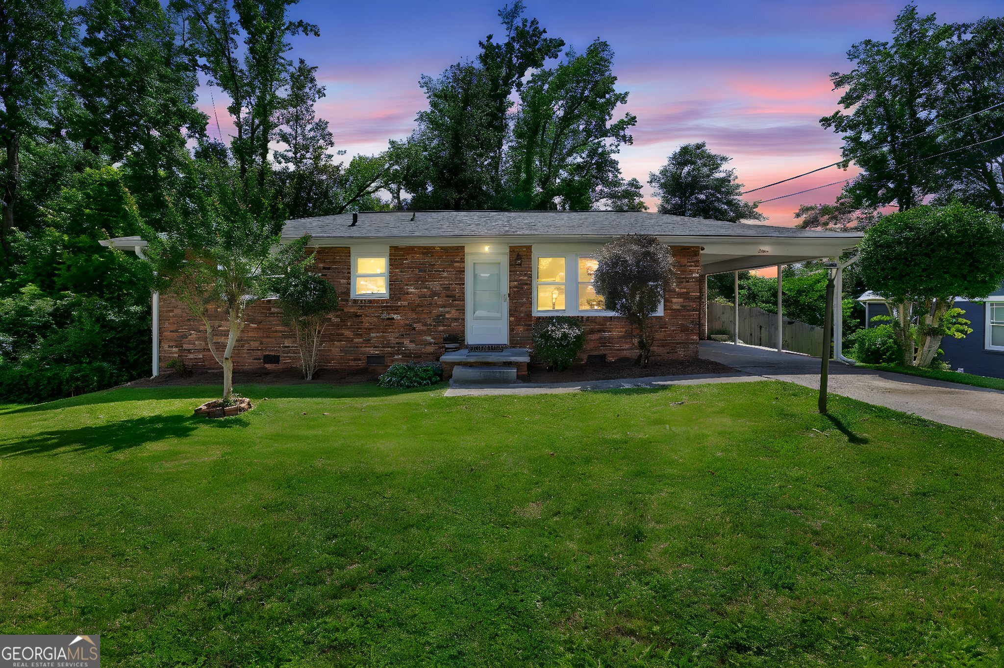 12 Conner Drive Newnan, GA 30263 - Photo 2 of 28 a front view of a house with a yard