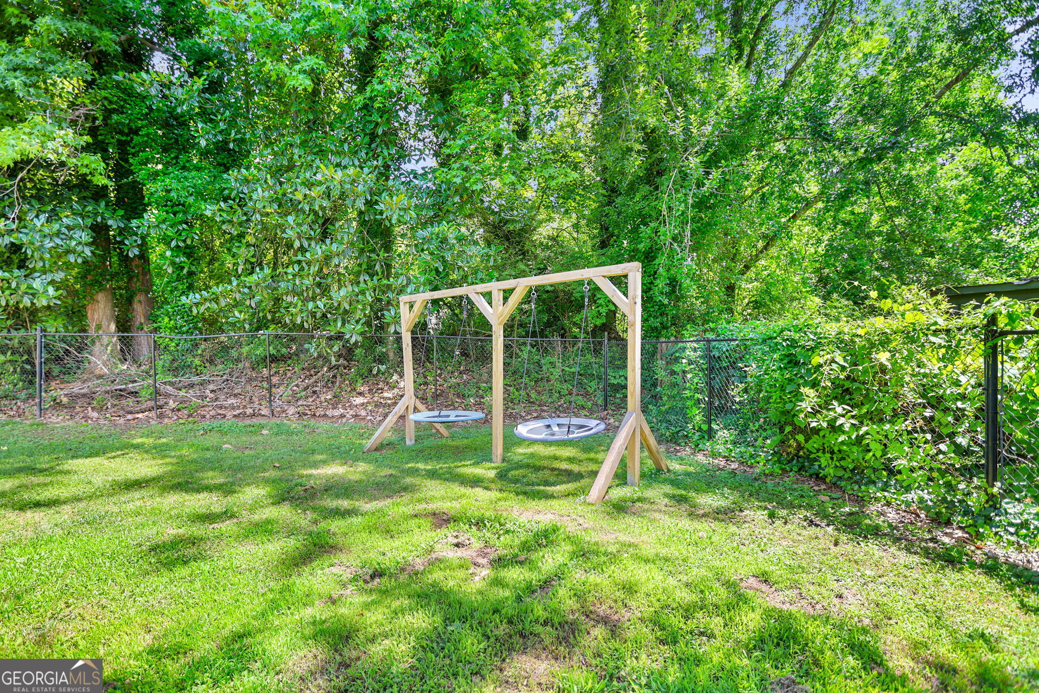 12 Conner Drive Newnan, GA 30263 - Photo 28 of 28 a view of a backyard with a small deck