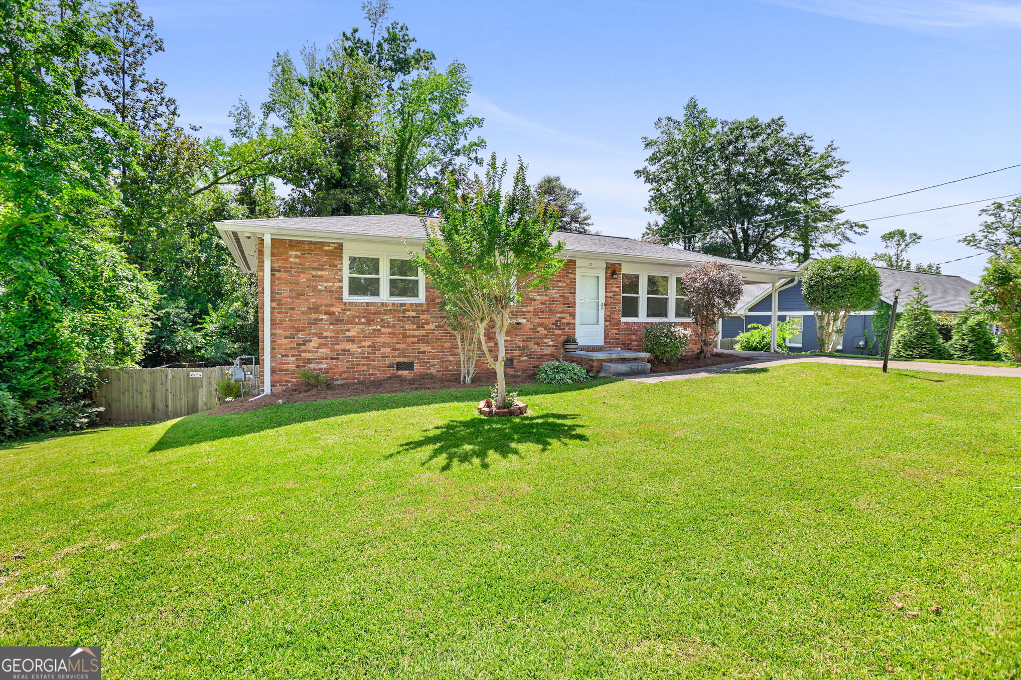 12 Conner Drive Newnan, GA 30263 - Photo 4 of 28 a front view of house with yard and green space