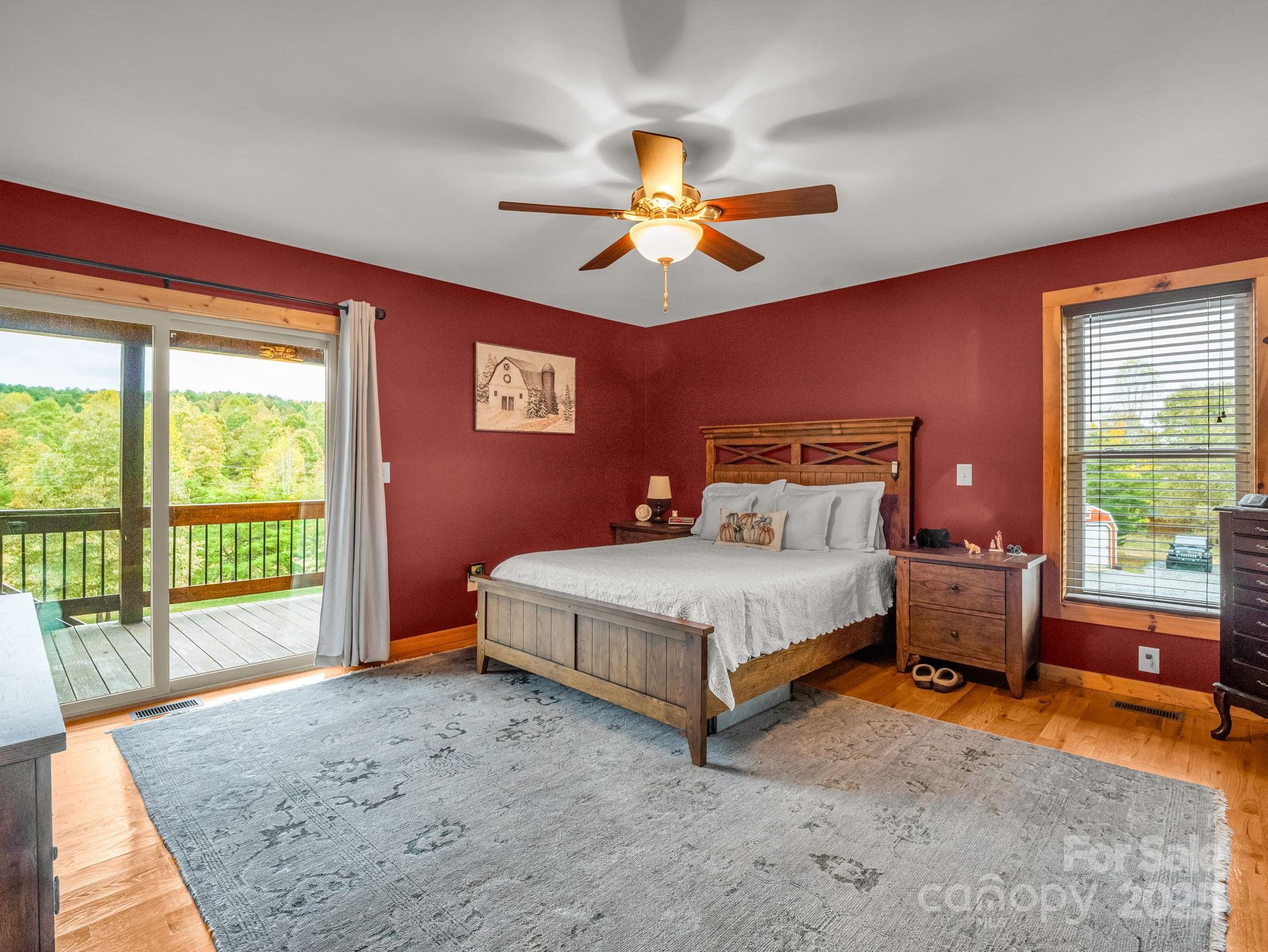 653 Moonlight Pass Union Mills, NC 28167 - Photo 14 of 44 a bedroom with a bed and a dresser next to a window