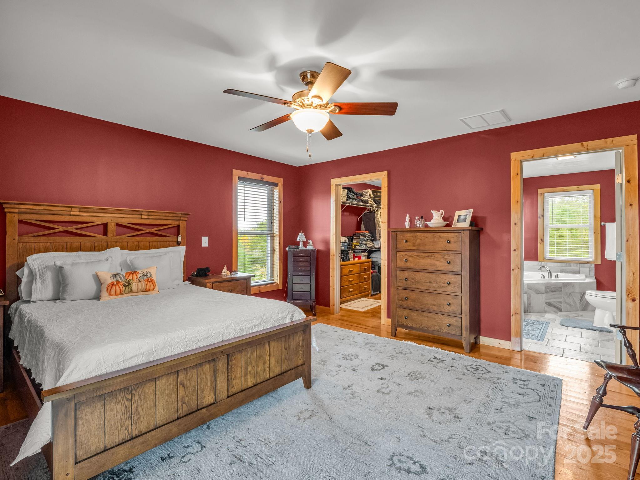 653 Moonlight Pass Union Mills, NC 28167 - Photo 15 of 44 a bedroom with a bed dresser and a large window