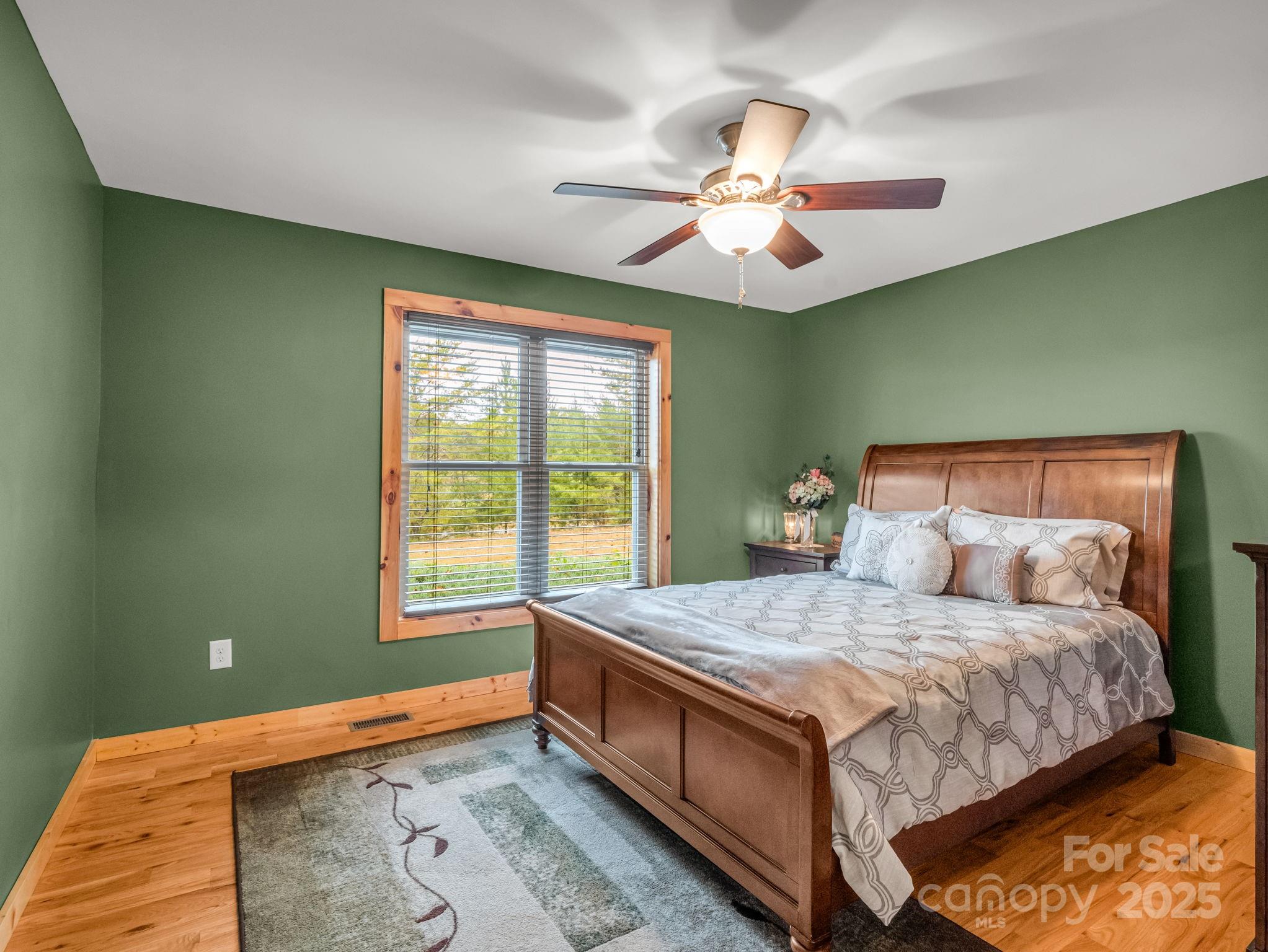 653 Moonlight Pass Union Mills, NC 28167 - Photo 19 of 44 a bedroom with a bed and window