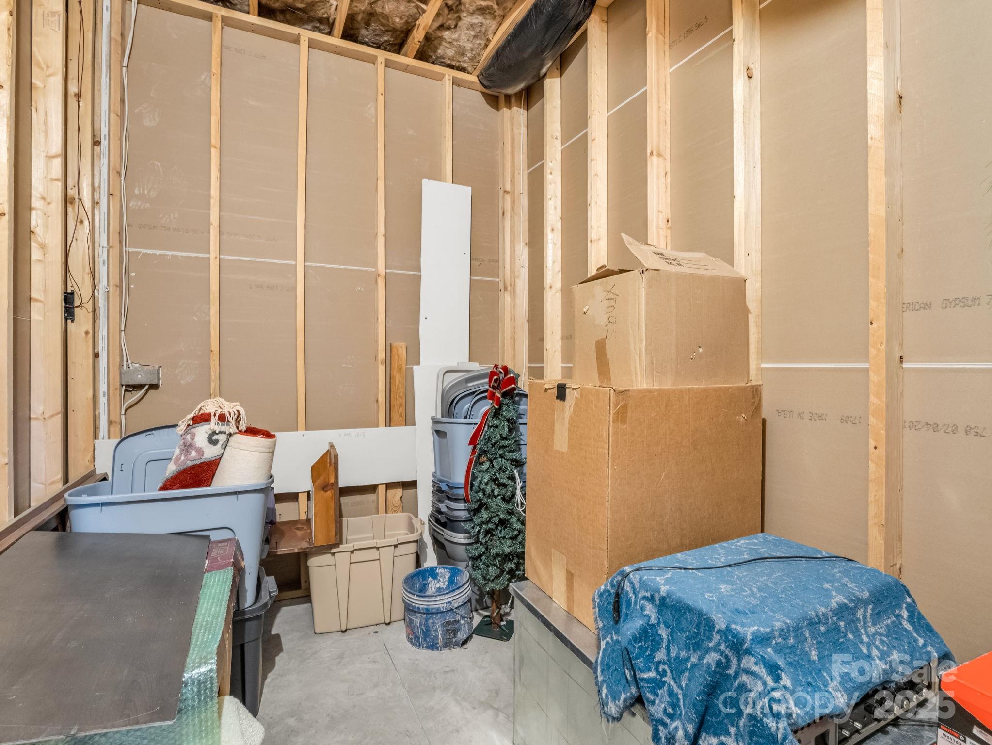 653 Moonlight Pass Union Mills, NC 28167 - Photo 28 of 44 a bedroom with a bed and a window