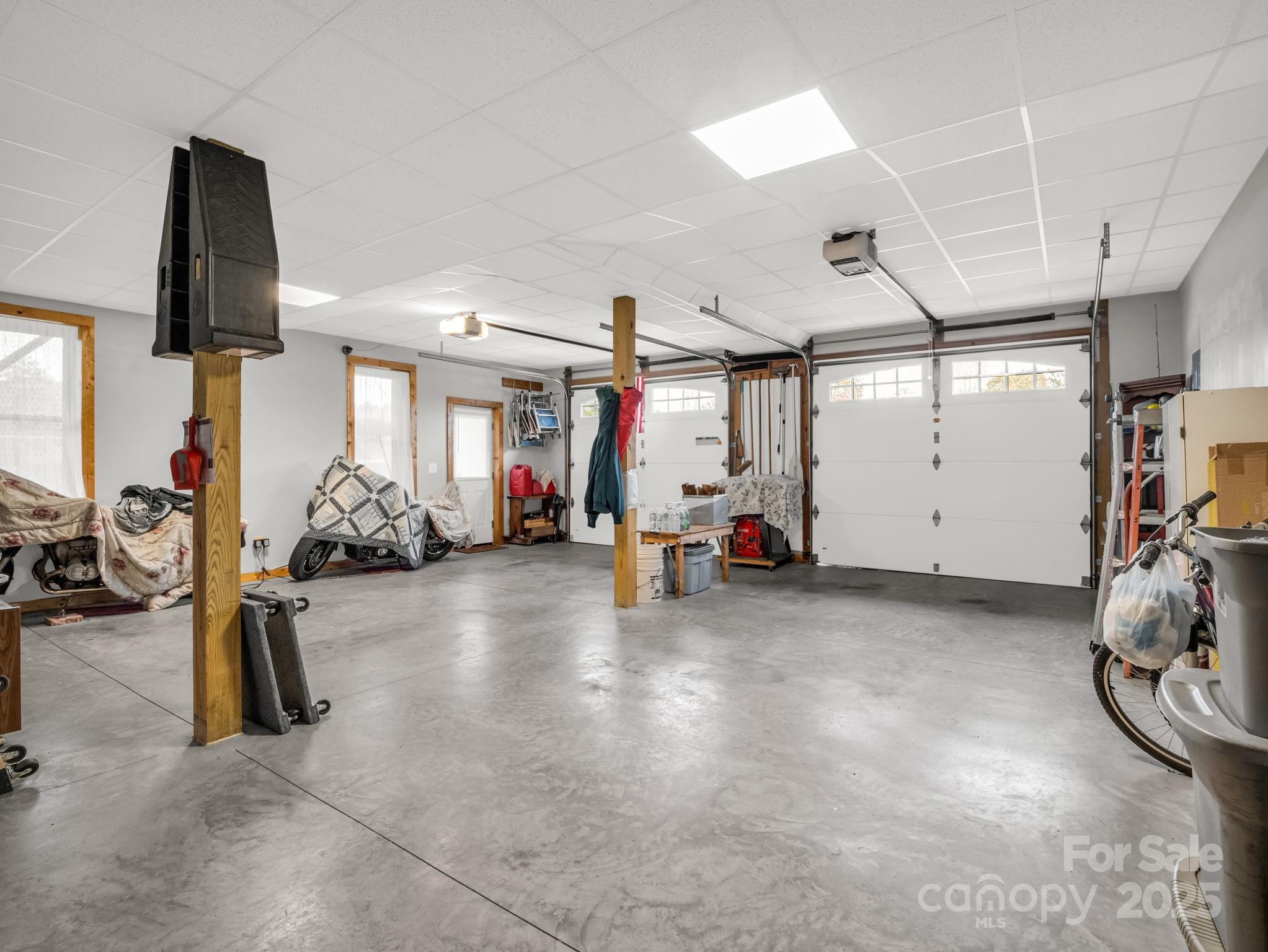 653 Moonlight Pass Union Mills, NC 28167 - Photo 31 of 44 a view of a garage with rack and bicycle
