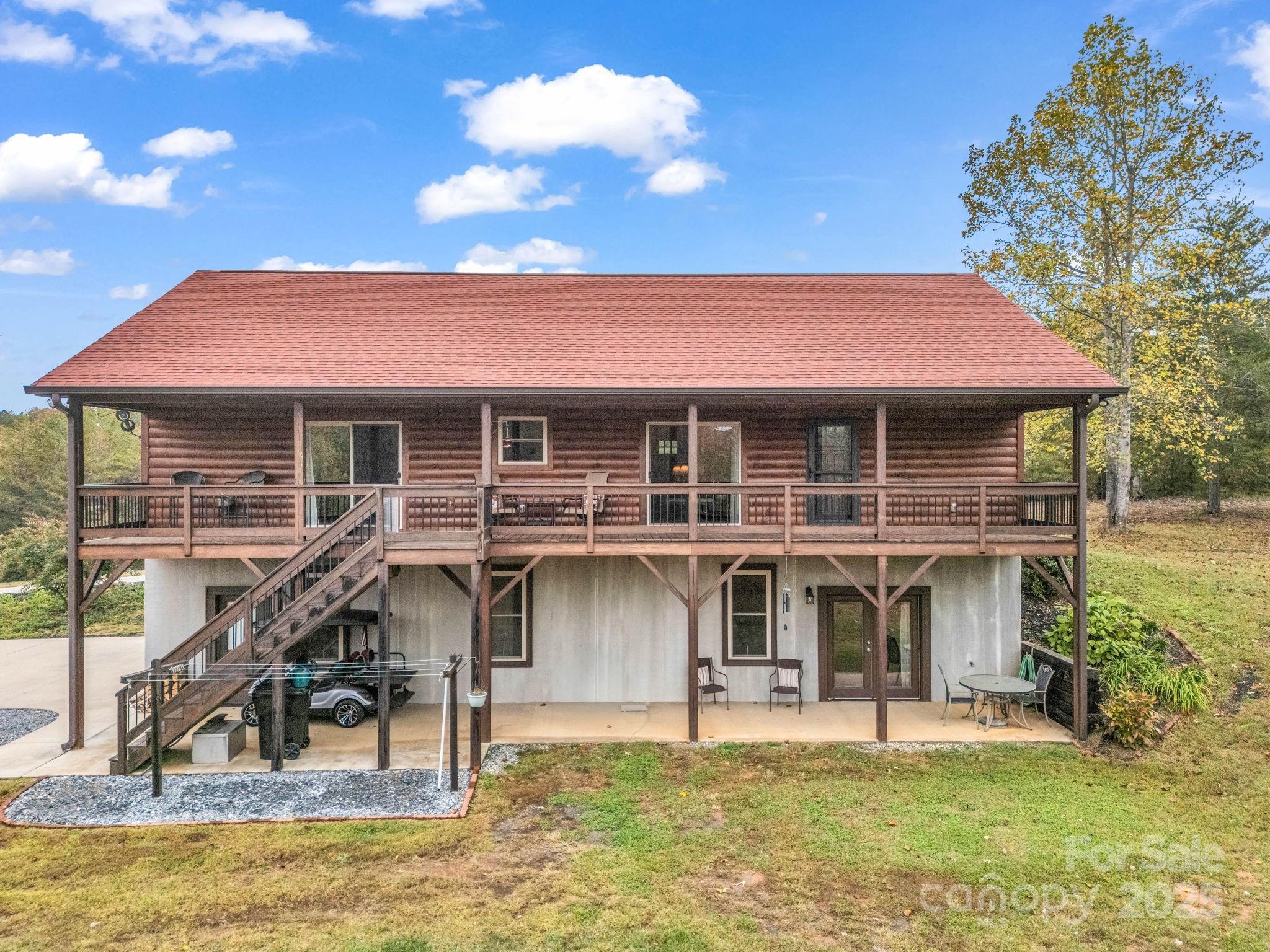 653 Moonlight Pass Union Mills, NC 28167 - Photo 34 of 44 a front view of a house with swimming pool