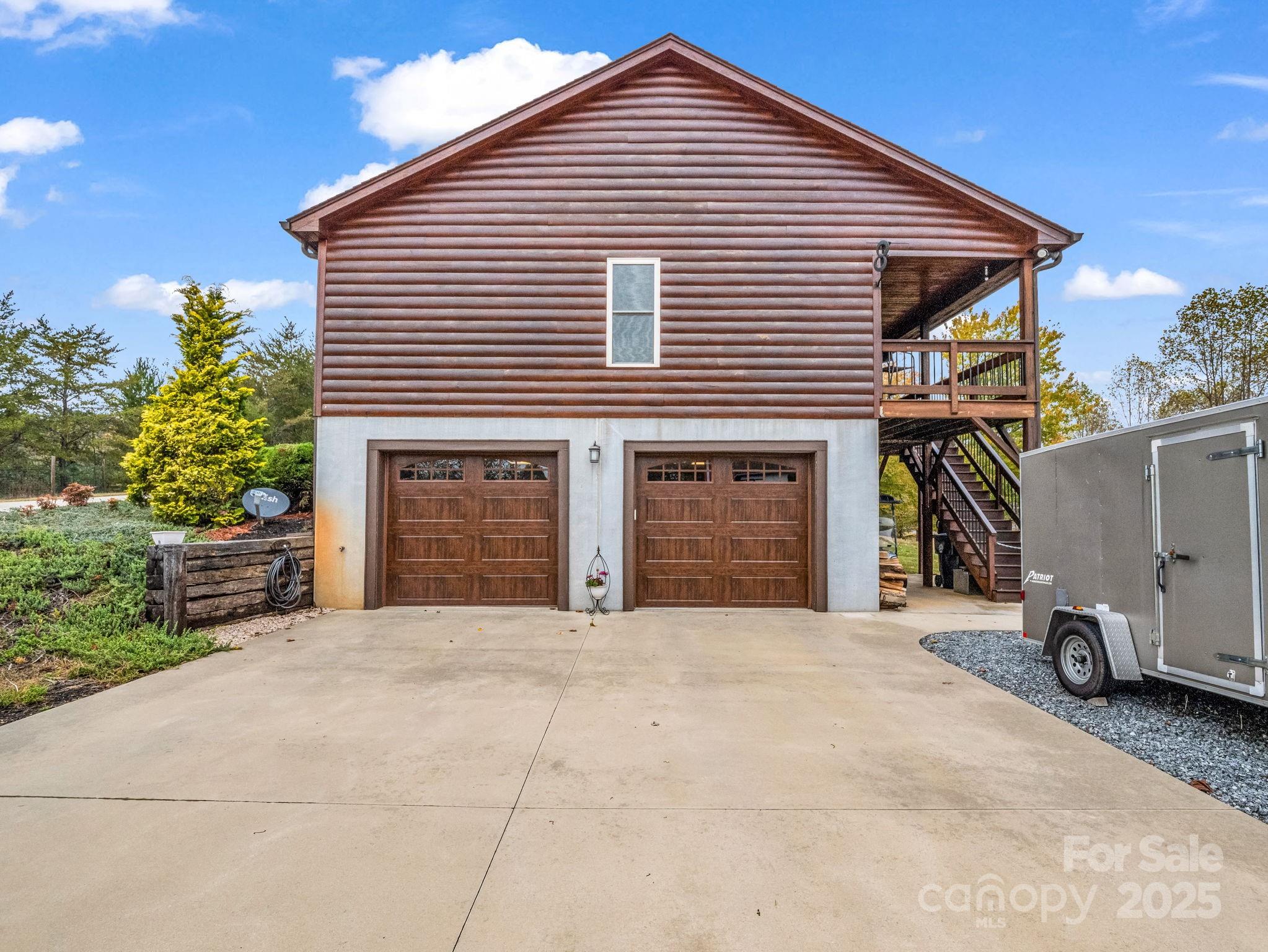 653 Moonlight Pass Union Mills, NC 28167 - Photo 35 of 44 a front view of a house with a garage