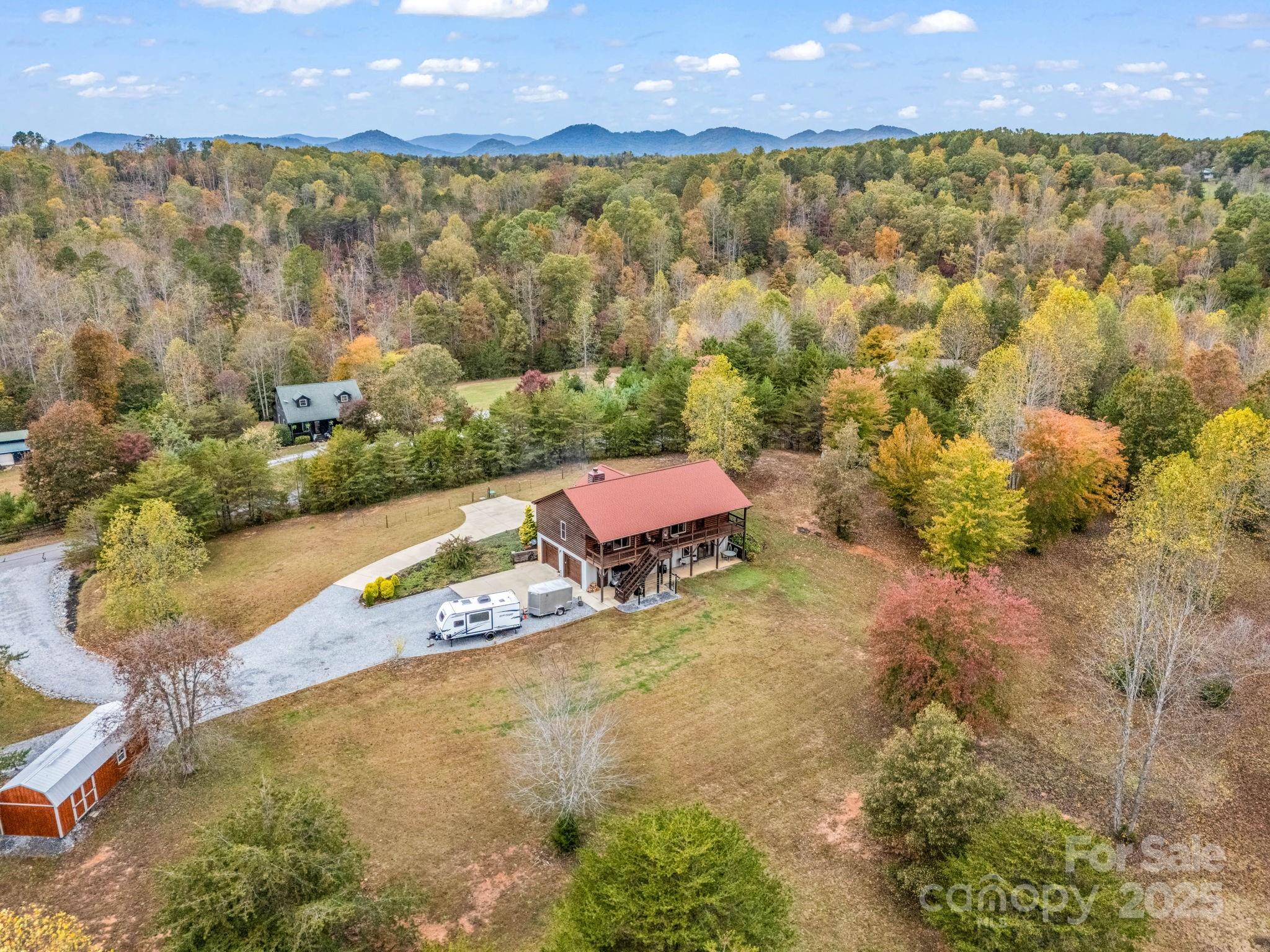 653 Moonlight Pass Union Mills, NC 28167 - Photo 39 of 44 a view of an outdoor space and a yard