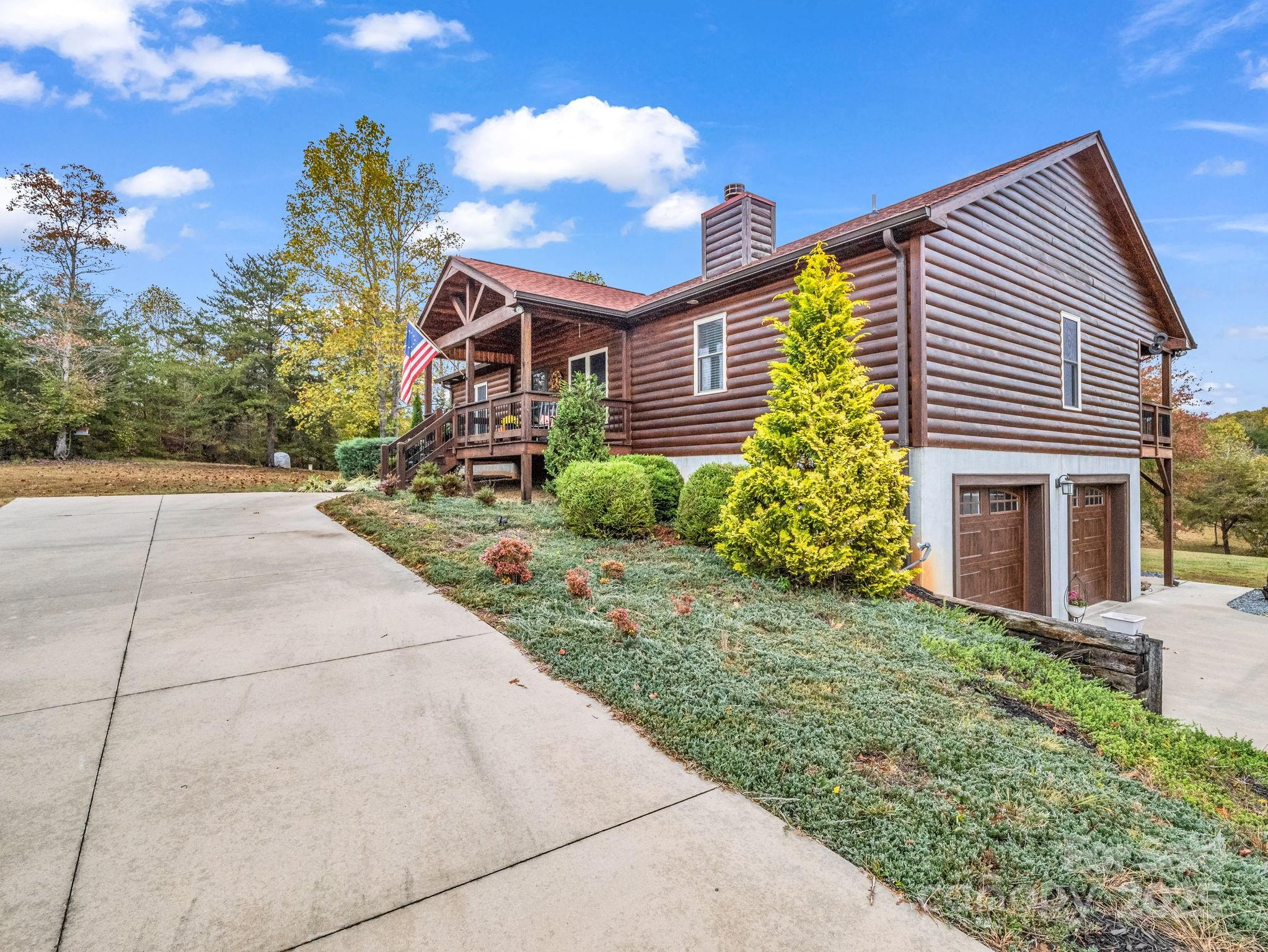 653 Moonlight Pass Union Mills, NC 28167 - Photo 41 of 44 a front view of a house with garden
