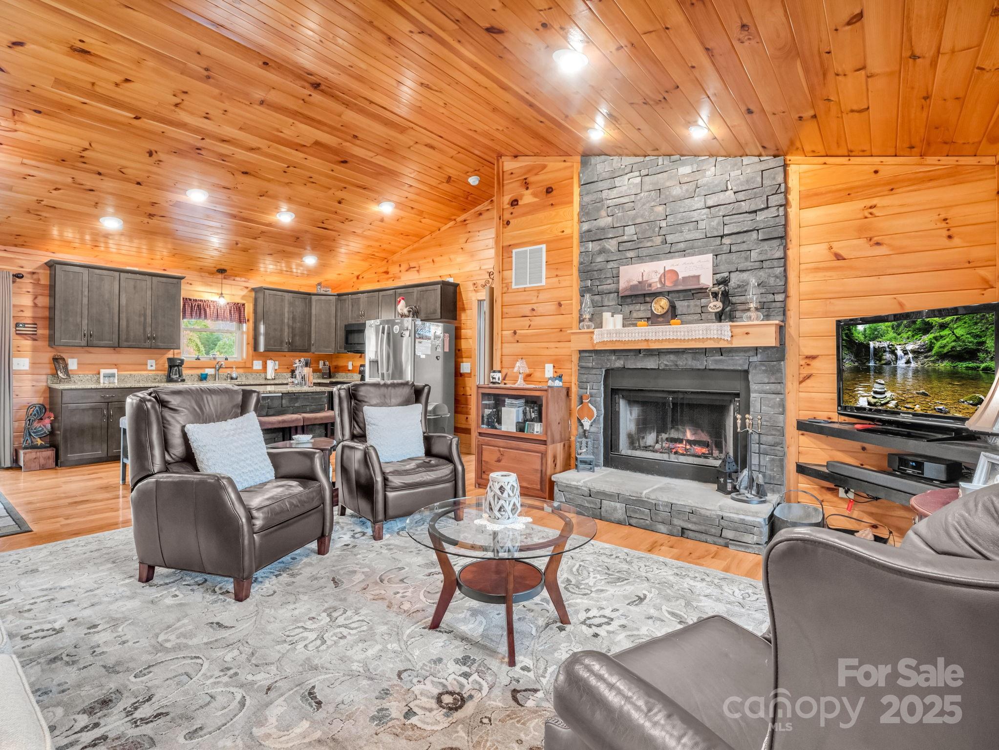 653 Moonlight Pass Union Mills, NC 28167 - Photo 7 of 44 a living room with furniture and a fireplace