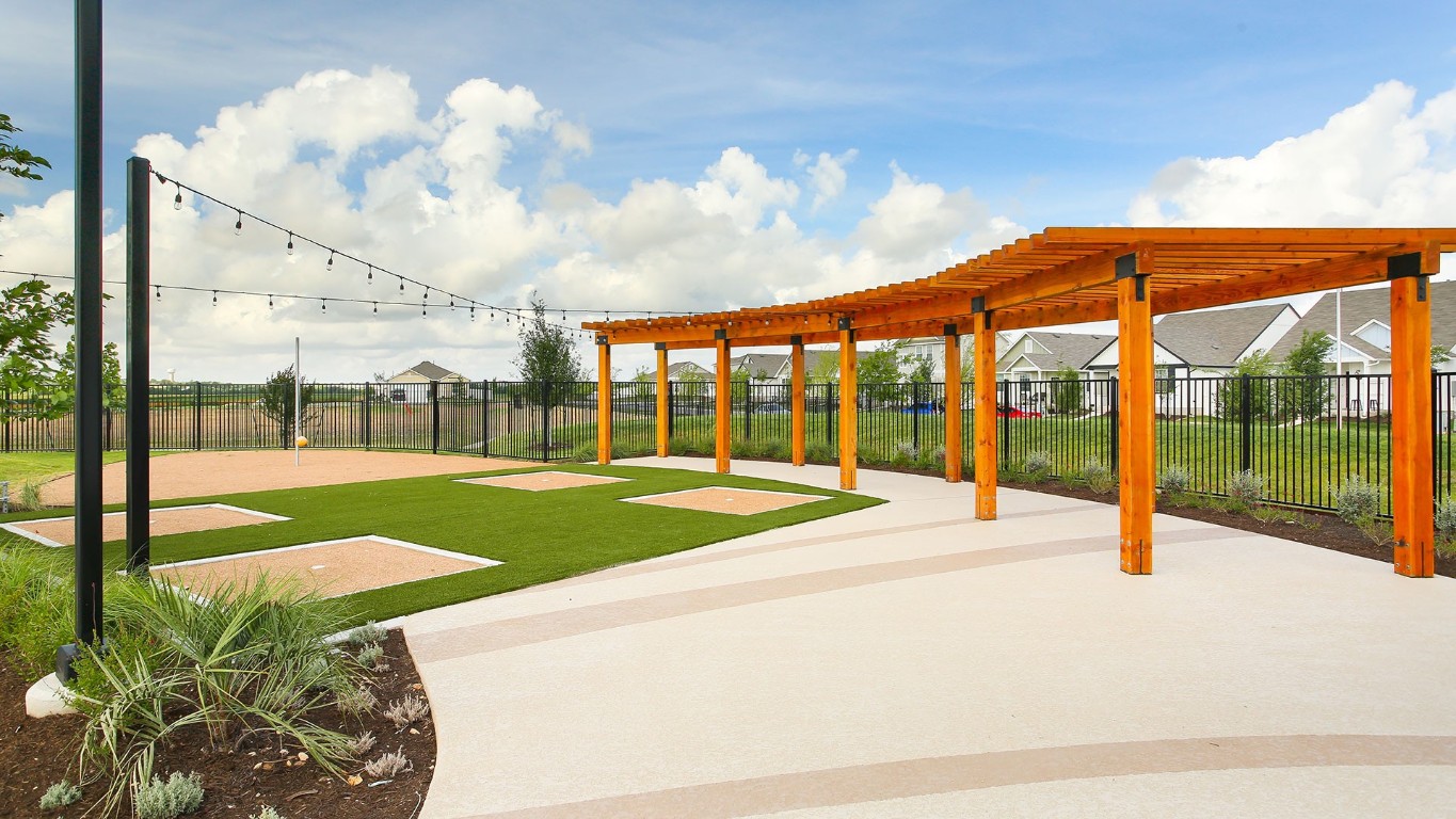 3085 Winding Creek Road Kyle, TX 78640 - Photo 9 of 17 View of home's community featuring a pergola