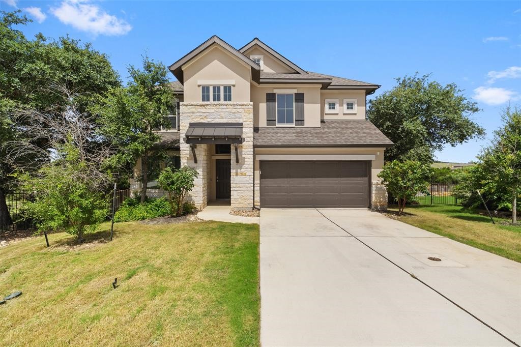 328 Pisa Lane Georgetown, TX 78628 - Photo 1 of 1 a front view of a house with a yard and garage