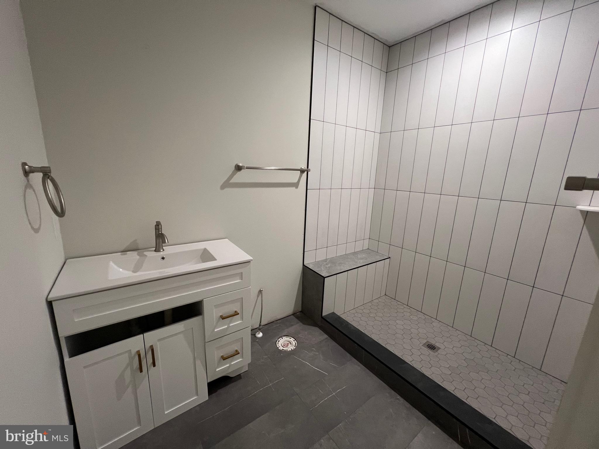 175 Rose Way Colonial Beach, VA 22443 - Photo 26 of 33 a bathroom with a sink and mirror