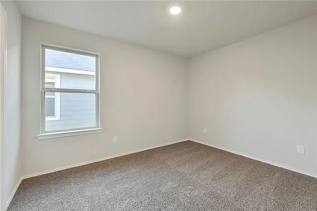 a bathroom with a granite countertop sink a shower and a mirror