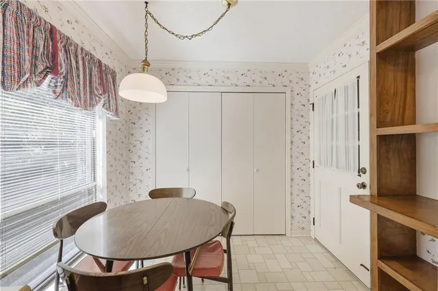 a bathroom with a sink a mirror and a shower