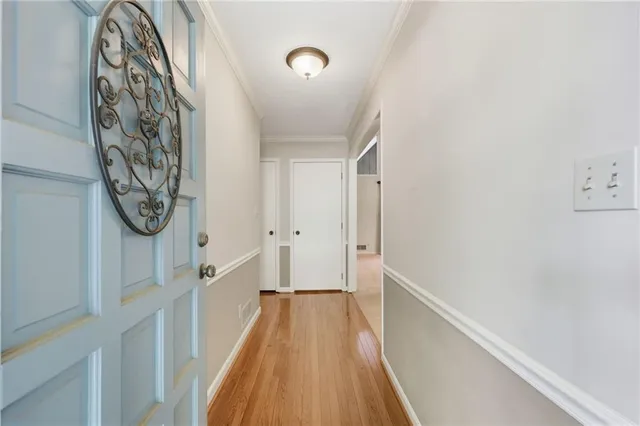 a view of a hallway with entryway
