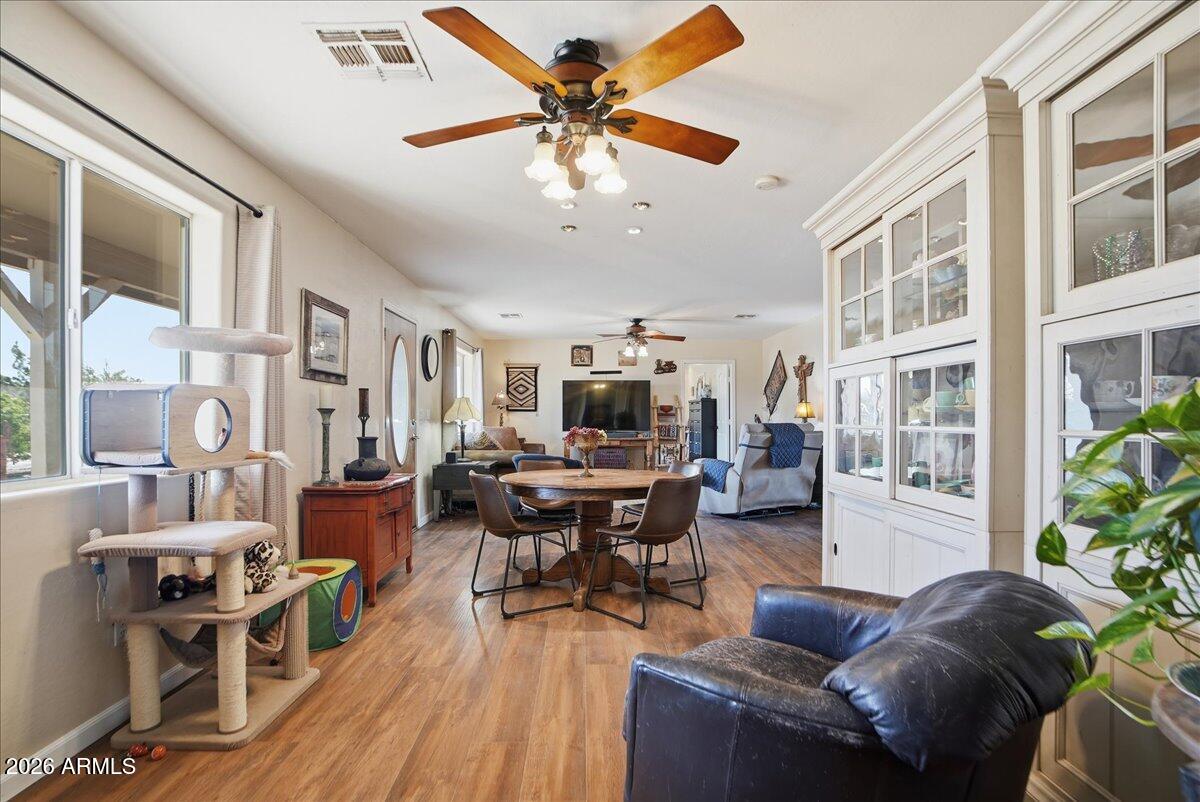 1414 West Ocotillo Road San Tan Valley, AZ 85140 - Photo 11 of 62 a living room with furniture kitchen view and a large window