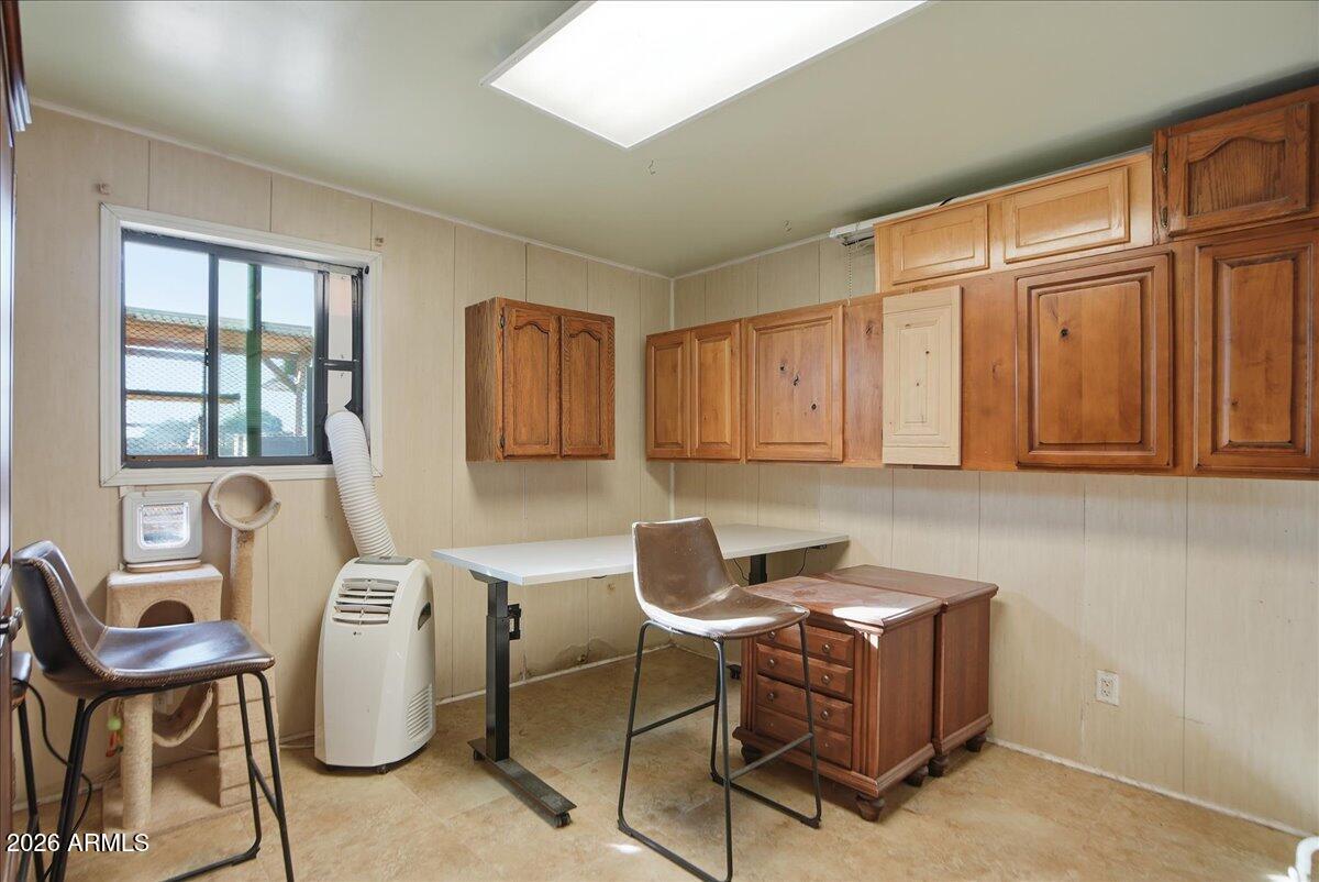1414 West Ocotillo Road San Tan Valley, AZ 85140 - Photo 34 of 62 a room with furniture a window and a piano
