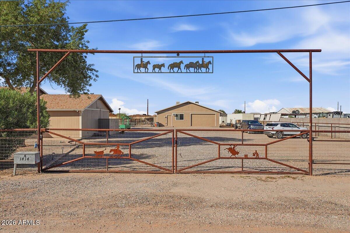 1414 West Ocotillo Road San Tan Valley, AZ 85140 - Photo 3 of 62 a view of a patio with table and chairs