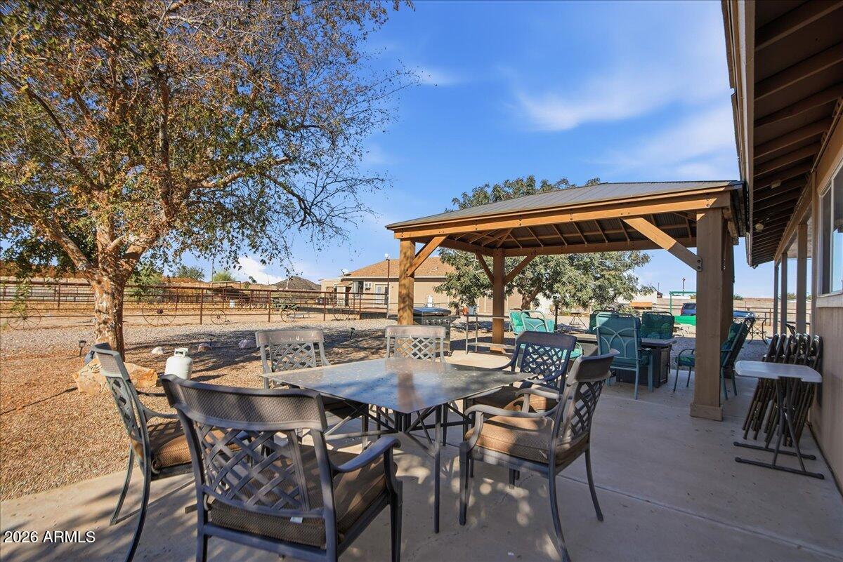 1414 West Ocotillo Road San Tan Valley, AZ 85140 - Photo 41 of 62 an outdoor space with furniture and city view