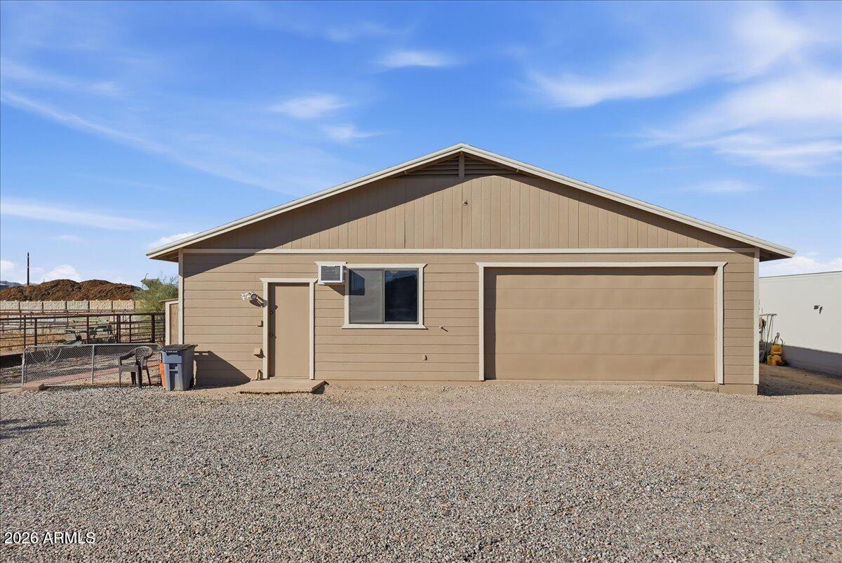 1414 West Ocotillo Road San Tan Valley, AZ 85140 - Photo 46 of 62 a view of a house with a backyard