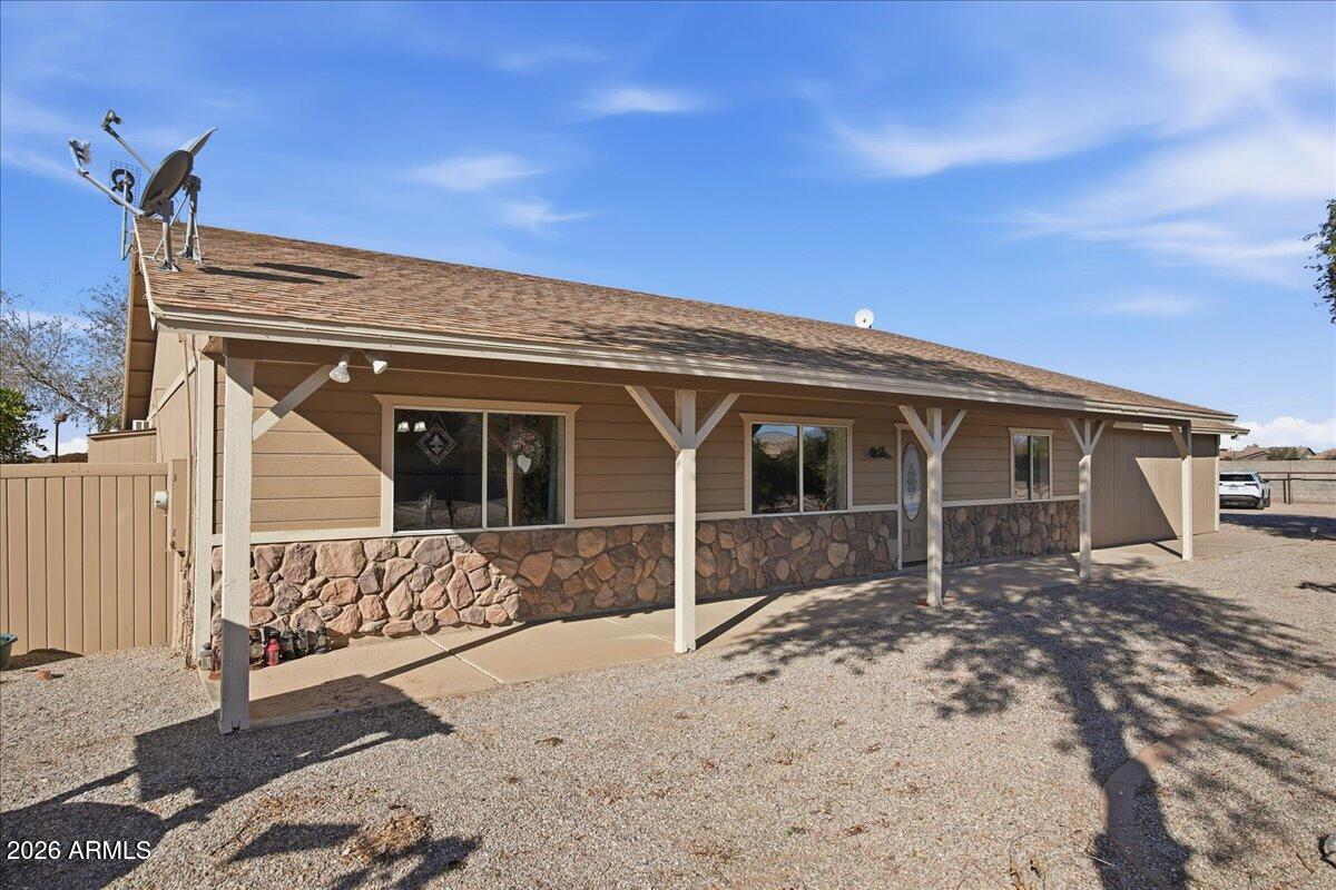 1414 West Ocotillo Road San Tan Valley, AZ 85140 - Photo 4 of 62 front view of a house with a yard