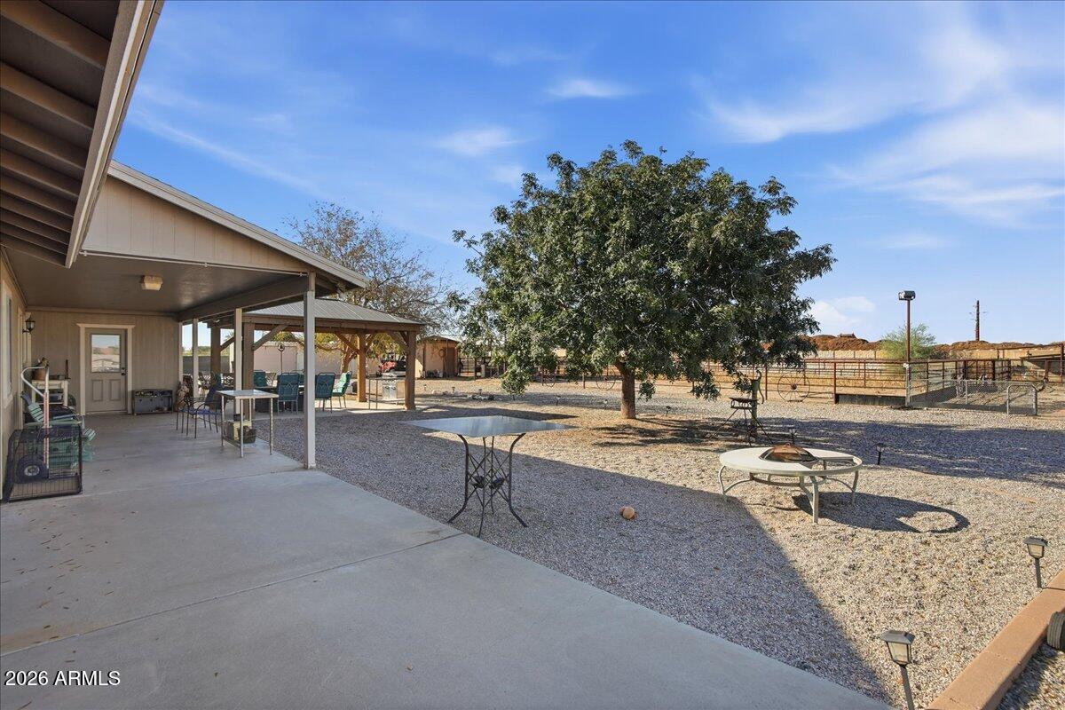 1414 West Ocotillo Road San Tan Valley, AZ 85140 - Photo 52 of 62 a view of a swimming pool with outdoor seating