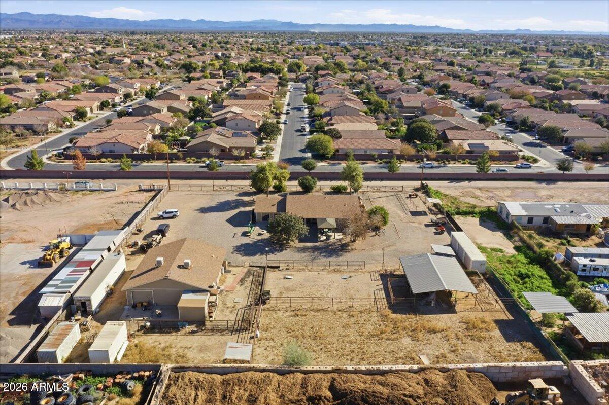 1414 West Ocotillo Road San Tan Valley, AZ 85140 - Photo 55 of 62 an aerial view of a house with a lake view