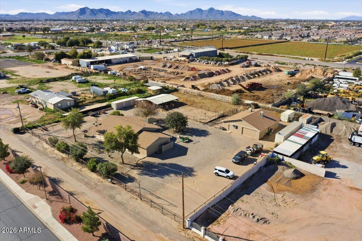 1414 West Ocotillo Road San Tan Valley, AZ 85140 - Photo 56 of 62 an aerial view of residential houses with outdoor space