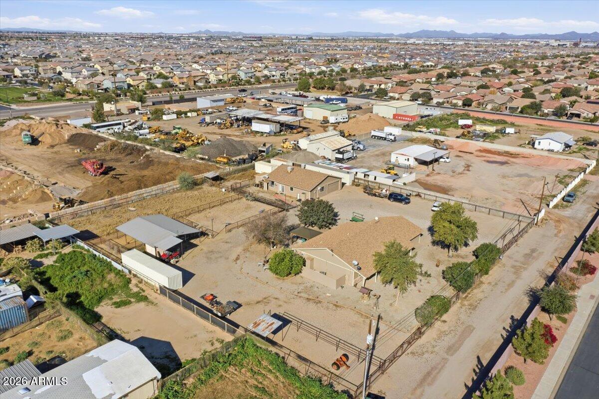 1414 West Ocotillo Road San Tan Valley, AZ 85140 - Photo 57 of 62 an aerial view of residential houses with outdoor space