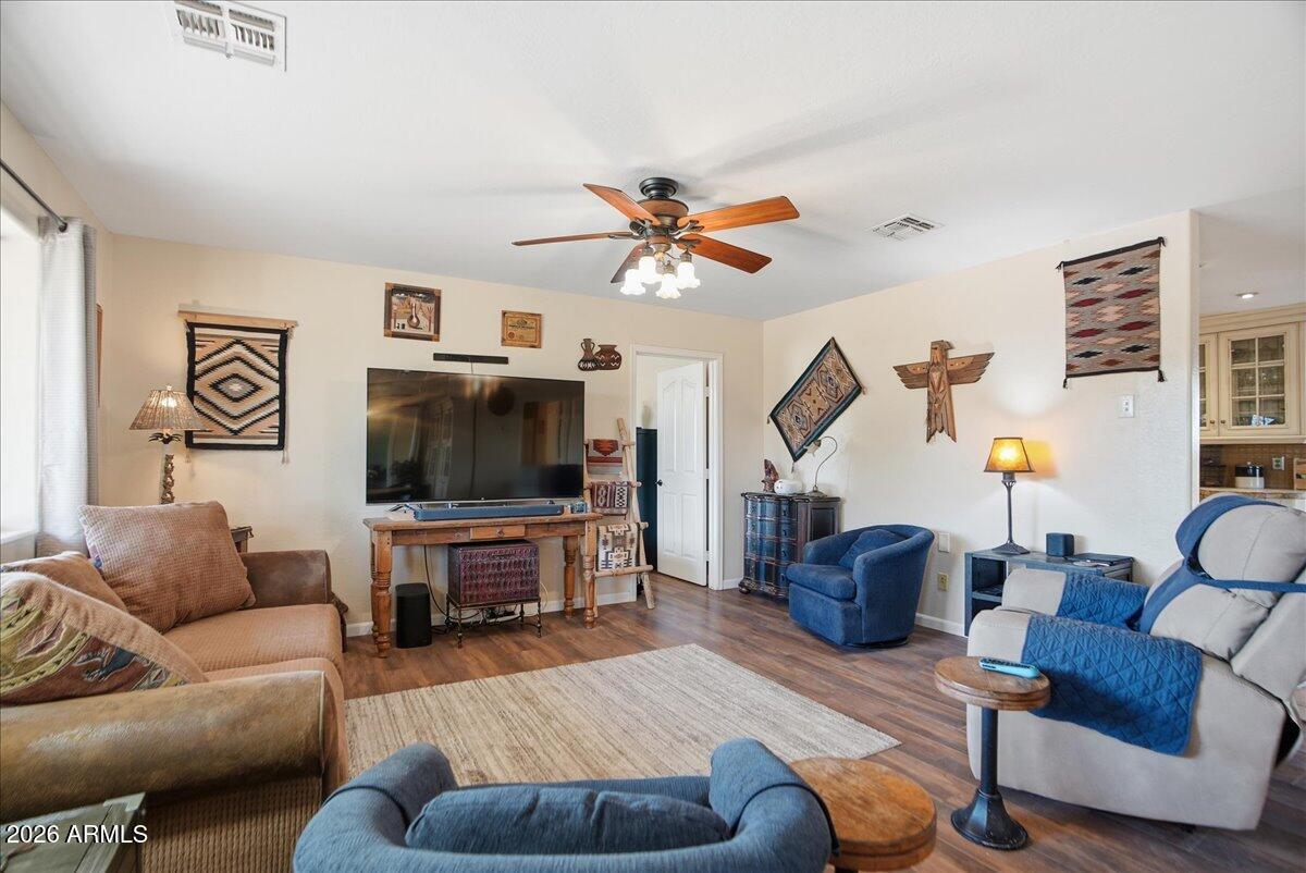 1414 West Ocotillo Road San Tan Valley, AZ 85140 - Photo 5 of 62 a living room with furniture and a flat screen tv