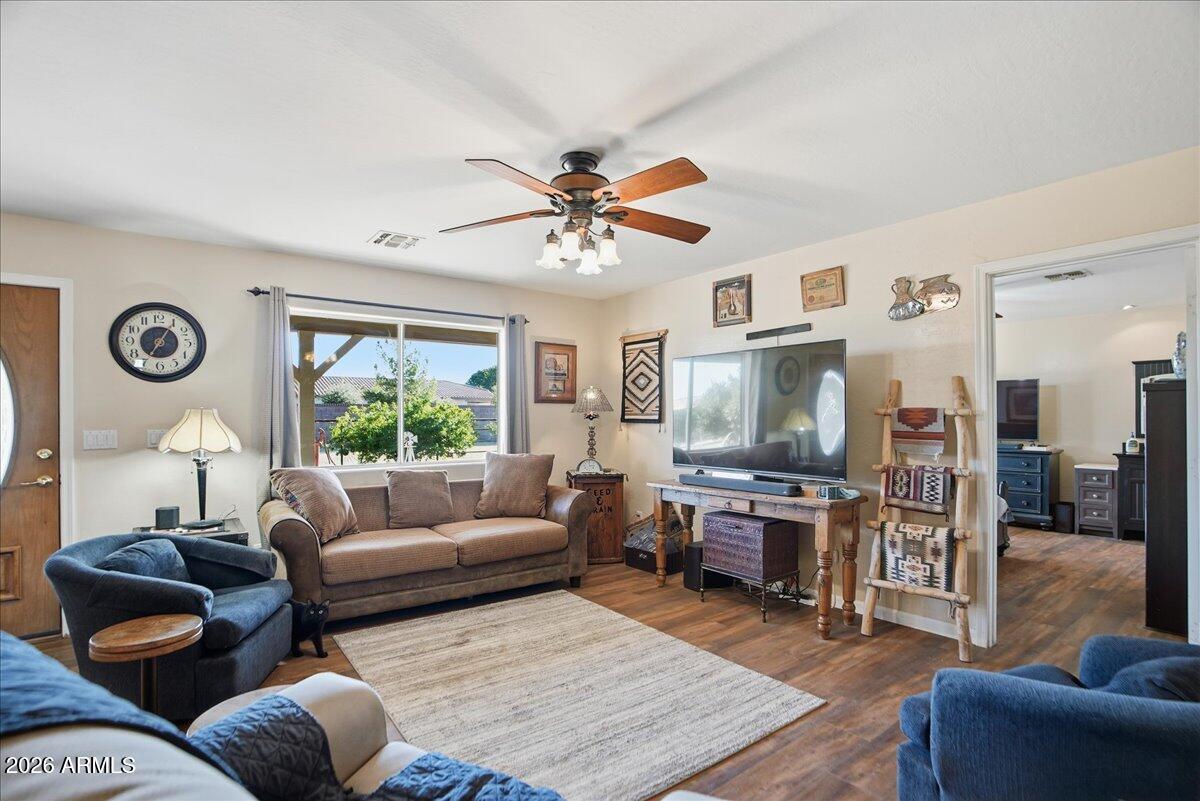1414 West Ocotillo Road San Tan Valley, AZ 85140 - Photo 6 of 62 a living room with furniture and a flat screen tv