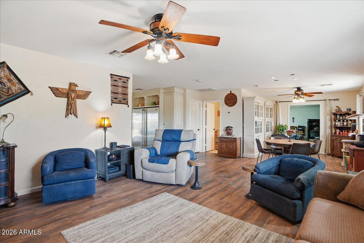 1414 West Ocotillo Road San Tan Valley, AZ 85140 - Photo 7 of 62 a living room with furniture and a large window