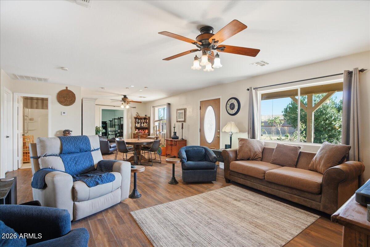 1414 West Ocotillo Road San Tan Valley, AZ 85140 - Photo 8 of 62 a living room with furniture and a large window