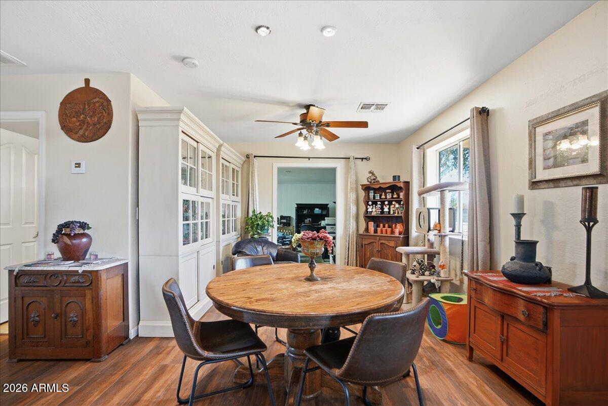 1414 West Ocotillo Road San Tan Valley, AZ 85140 - Photo 9 of 62 a dining room with furniture and window